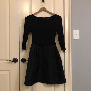 Women’s black formal dress.